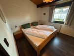 Schlafzimmer - Ferienhaus Winterzauber - Top-Hundeurlaub