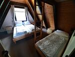Schlafzimmer - Ferienhaus Winterhauch - Top-Hundeurlaub