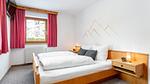 Schlafzimmer - Ferienwohnung für 8 Personen (56 m²) in Kirchberg in Tirol - Top-Hundeurlaub