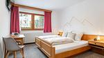 Schlafzimmer - Ferienwohnung für 8 Personen (56 m²) in Kirchberg in Tirol - Top-Hundeurlaub