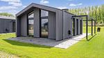 Außenseite Ferienhaus [Sommer] - Ferienhaus für 4 Personen (55 m²) - Top-Hundeurlaub
