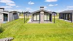 Außenseite Ferienhaus [Sommer] - Ferienhaus für 4 Personen (55 m²) - Top-Hundeurlaub