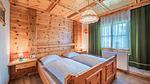 Schlafzimmer - Ferienhaus für 13 Personen (160 m²) in Wald im Pinzgau - Top-Hundeurlaub