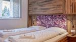 Schlafzimmer - Ferienwohnung für 9 Personen (50 m²) in Bruck an der Glocknerstraße - Top-Hundeurlaub