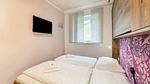 Schlafzimmer - Ferienwohnung für 9 Personen (50 m²) in Bruck an der Glocknerstraße - Top-Hundeurlaub