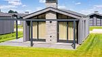 Außenseite Ferienhaus [Sommer] - Ferienhaus für 4 Personen (55 m²) - Top-Hundeurlaub