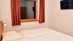 Schlafzimmer - Ferienwohnung für 12 Personen (127 m²) in Brixen im Thale - Top-Hundeurlaub
