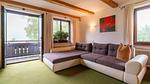 Wohnzimmer - Ferienwohnung für 7 Personen (80 m²) in Brixen im Thale - Top-Hundeurlaub