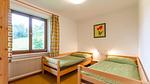 Schlafzimmer - Ferienwohnung für 7 Personen (80 m²) in Brixen im Thale - Top-Hundeurlaub