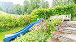 Garten [Sommer] - Ferienwohnung für 7 Personen (80 m²) in Brixen im Thale - Top-Hundeurlaub