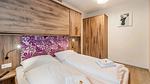Schlafzimmer - Ferienwohnung für 7 Personen (40 m²) in Bruck an der Glocknerstraße - Top-Hundeurlaub