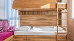 Schlafzimmer - Ferienwohnung für 7 Personen (40 m²) in Bruck an der Glocknerstraße - Top-Hundeurlaub