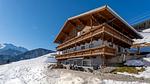 Außenseite Ferienhaus [Winter] - Ferienwohnung für 11 Personen (100 m²) in Wald im Pinzgau - Top-Hundeurlaub