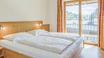 Schlafzimmer - Ferienwohnung für 14 Personen (151 m²) in Brixen im Thale - Top-Hundeurlaub