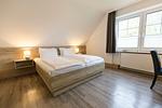 Schlafzimmer - Cuxlandhotel  Doppelzimmer 116 - Top-Hundeurlaub