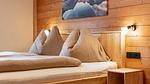 Schlafzimmer - Ferienwohnung für 7 Personen (100 m²) in Alpbach - Top-Hundeurlaub