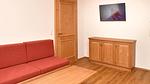 Wohnzimmer - Ferienwohnung für 13 Personen (136 m²) in Brixen im Thale - Top-Hundeurlaub