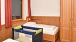 Schlafzimmer - Ferienwohnung für 13 Personen (136 m²) in Brixen im Thale - Top-Hundeurlaub