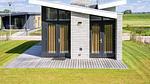 Außenseite Ferienhaus [Sommer] - Ferienhaus für 4 Personen (55 m²) - Top-Hundeurlaub