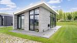 Außenseite Ferienhaus [Sommer] - Ferienhaus für 4 Personen (55 m²) - Top-Hundeurlaub