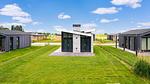 Außenseite Ferienhaus [Sommer] - Ferienhaus für 4 Personen (55 m²) - Top-Hundeurlaub