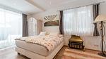 Schlafzimmer - Ferienwohnung für 8 Personen (110 m²) in Bramberg am Wildkogel - Top-Hundeurlaub