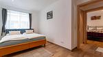 Schlafzimmer - Ferienwohnung für 8 Personen (110 m²) in Bramberg am Wildkogel - Top-Hundeurlaub