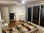 Schlafzimmer mit Bett und Teppich im Ferienhaus Villa Bergsmåla - Villa Bergsmåla - Top-Hundeurlaub