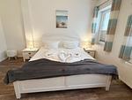 Schlafzimmer - Mien Hus, Wohnung 1 - Top-Hundeurlaub