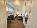 Schlafzimmer - Mien Hus, Wohnung 1 - Top-Hundeurlaub