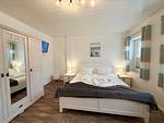 Schlafzimmer - Mien Hus, Wohnung 1 - Top-Hundeurlaub