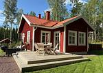 Rotes Schwedenhaus mit Terrasse und eingezäuntem Garten in Aneby - Paws of Idhult - Top-Hundeurlaub