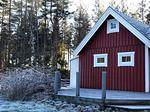 Ferienhaus im Winter mit Schnee im Wald in Südschweden - Villa Yasjö - Top-Hundeurlaub
