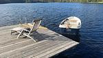 Steg mit Liegestuhl und Ruderboot am See Yasjön - Villa Yasjö - Top-Hundeurlaub