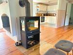 Kaminofen im offenen Wohnbereich der Villa Yasjö - Villa Yasjö - Top-Hundeurlaub