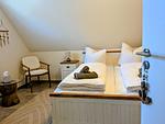 Schlafzimmer 2 mit Doppelbett und Kommode - Ausklang - Top-Hundeurlaub