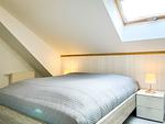 drittes Schlafzimmer im Dachgeschoss mit Doppelbett - Wohnung 03-5 - Top-Hundeurlaub