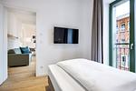 Schlafzimmer mit Einzelbett und TV - Krusespeicher 3-47 - Top-Hundeurlaub