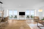 Wohnzimmer - Ferienwohnung Nordglanz Olpenitz - Top-Hundeurlaub