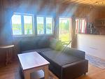 Wohnzimmer mit Sofa und Seeblick im Ferienhaus Söda Fullsjön - Sodra Fullsjön - Top-Hundeurlaub