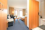 Wohnzimmer - Deutsches Haus Zimmer 18 - Top-Hundeurlaub