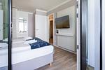 Schlafzimmer - Deluxe-Apartment 1.11 - Top-Hundeurlaub