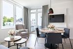 Wohnzimmer - Deluxe-Suite 2.04 mit Ost Loggia und Wellness - Top-Hundeurlaub