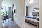 Wohnzimmer - Deluxe-Suite 2.04 mit Ost Loggia und Wellness - Top-Hundeurlaub