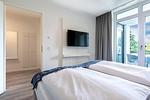 Schlafzimmer - Deluxe-Suite 2.04 mit Ost Loggia und Wellness - Top-Hundeurlaub
