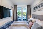 Schlafzimmer - Deluxe-Apartment 1.10 - Top-Hundeurlaub