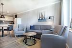Wohnzimmer - Deluxe-Apartment 2.14 mit eigener e-Ladesäule, XL-Strandkorb und Hundefreundlich - Top-Hundeurlaub
