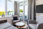 Wohnzimmer - Deluxe-Apartment 2.14 mit eigener e-Ladesäule, XL-Strandkorb und Hundefreundlich - Top-Hundeurlaub