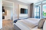 Schlafzimmer - Deluxe-Apartment 2.14 mit eigener e-Ladesäule, XL-Strandkorb und Hundefreundlich - Top-Hundeurlaub