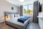 Schlafzimmer - Deluxe-Suite 2.01 mit West-Loggia und hundefreundlich - Top-Hundeurlaub